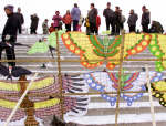 Chinese vendors sell kites along the embankment of the famous Songhua Jiang river in Harbin, capital of Northeast China's Heilongjiang province, on January 16, 2002. Reuters/China Photo