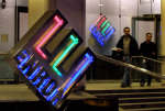 Employees leaving the Enron headquarters in Houston, Texas. Photo: Reuters/Richard Carson