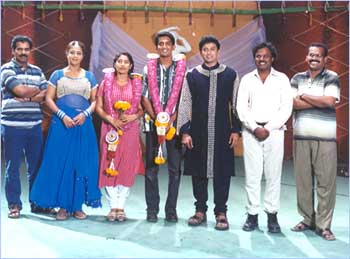 The happy couple with Prashant (second from right) and Jyotika (in blue)