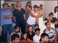 The cast and crew of Lagaan, watching the Oscars