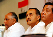 Praful Patel flanked by Pawar and Sangma