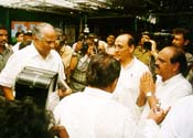 Pawar's supporters led by Bhujbal greeting him