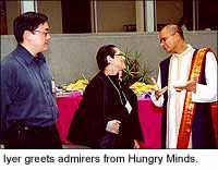 Edwin Kuo of Hungry Minds Publishing and Sue Zelickson of WCCO Radio, Minneapolis, with Iyer