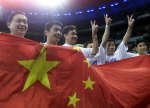 China's gymnasts celebrate winning the men's team gymnastics gold. REUTERS/Jerry Lampen 