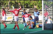 Air India players celebrate after Devinder Kumar (No. 12) scores.