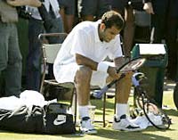 A dejected Sampras after his second round defeat.
