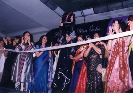 Persis Khambatta, accompanied by the Miss Indias, at the release of her book